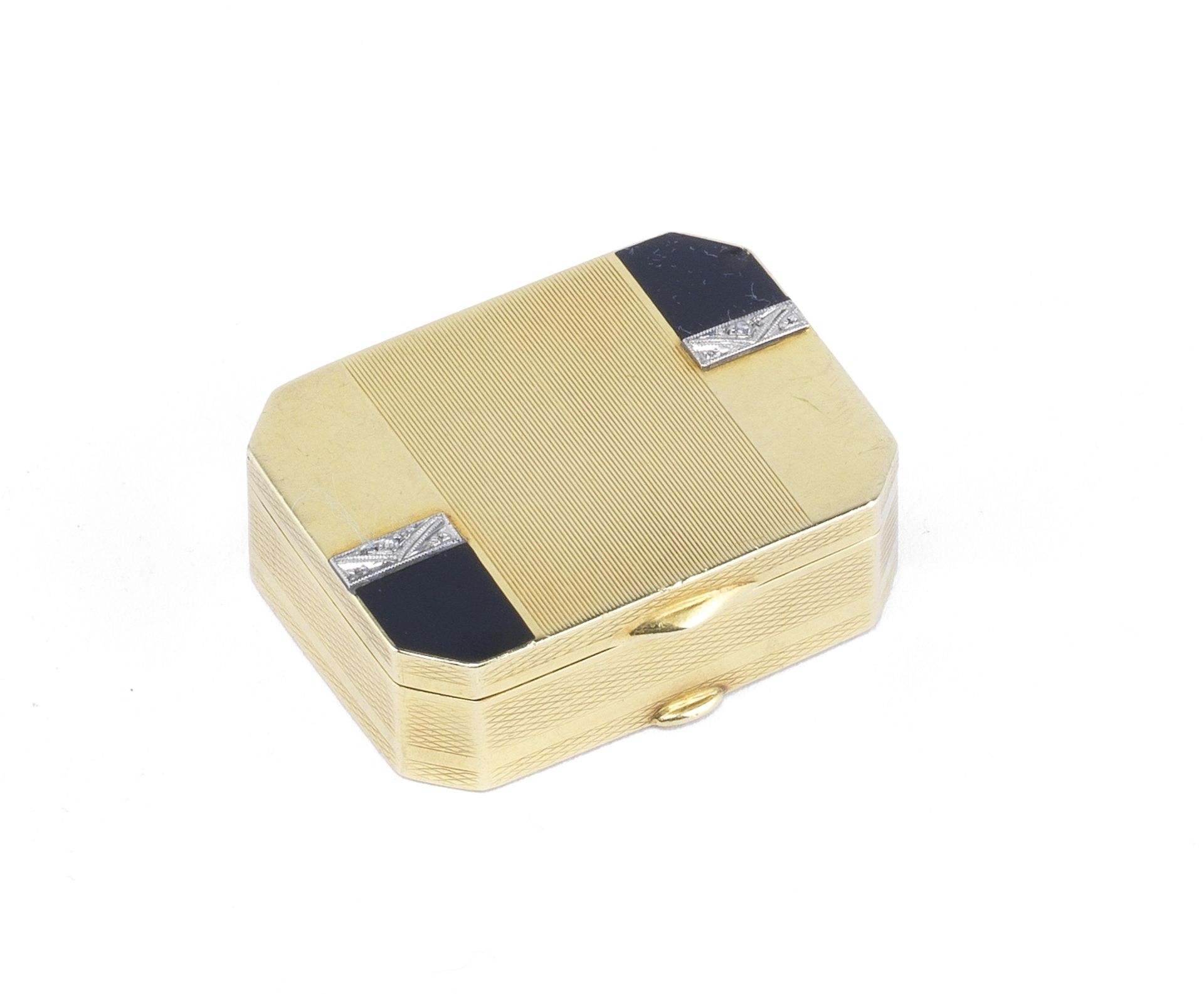 An Art Deco diamond-set gold pill box circa 1940, stamped '750' and 'S'