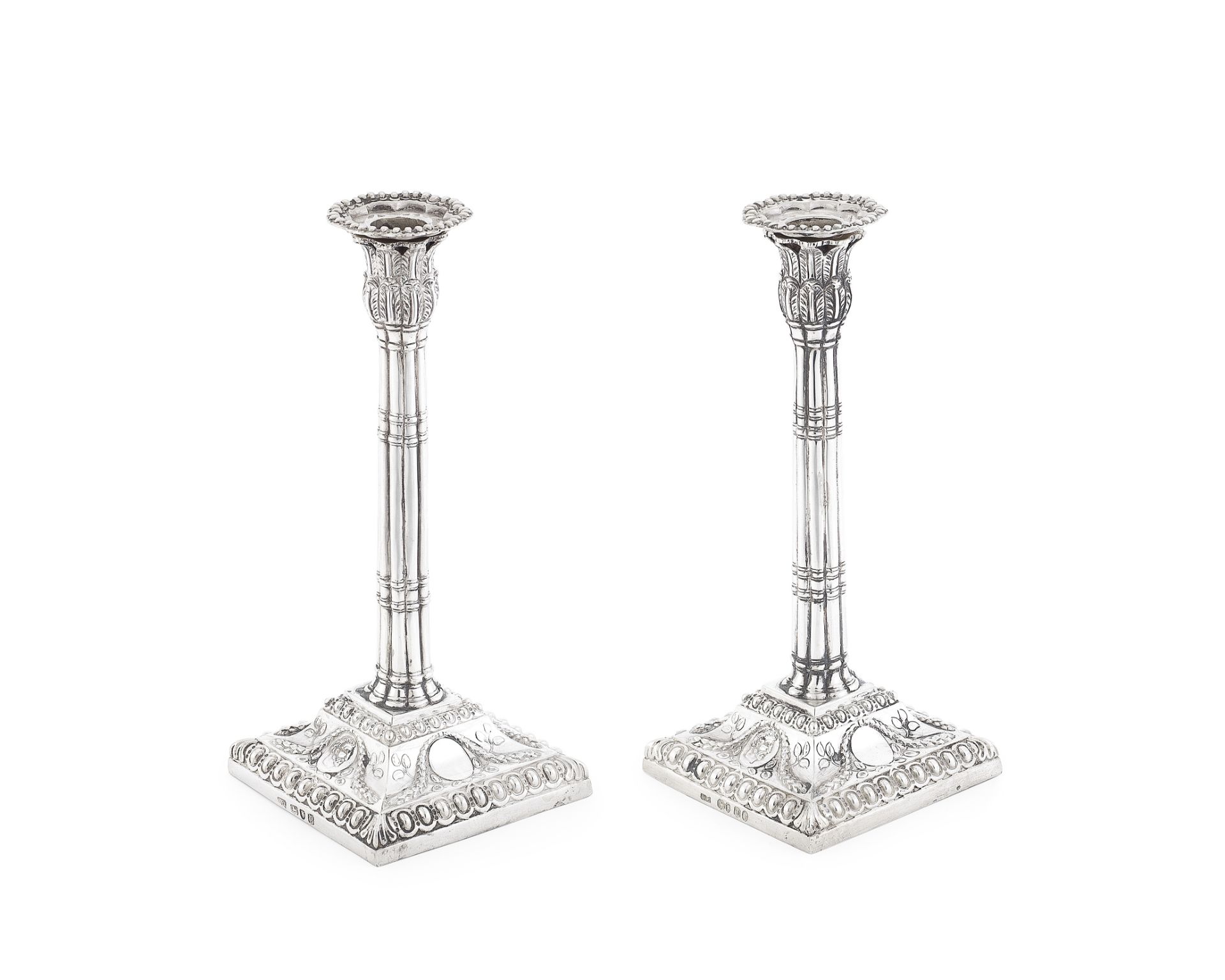 A matched pair of silver tapersticks one John Carter II, London 1770, the other Walter Morrisse,...