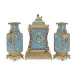 A good late 19th century French gilt bronze and champleve enamel Japonisme clock garniture the mo...