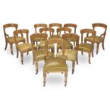 A set of twelve mid Victorian gothic revival oak dining chairs attributed to E.W. Pugin (12)