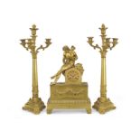 An early 19th century French matched gilt bronze figural clock garniture (3)