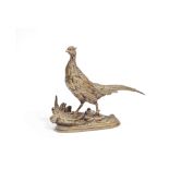 Paul Edouard Delabrierre (French, 1829-1912): A late 19th century gilt bronze medal of a pheasant