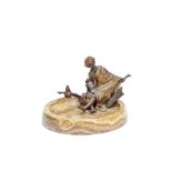 Franz Bergman (Austrian, 1861-1936): A cold painted bronze and Algerian onyx figural ashtray depi...