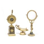 A late 19th/early 20th century French gilt bronze watch stand together with a similar period figu...