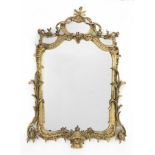 A 19th century giltwood and gilt gesso mirror in the George III style