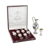 A 'Silver Jubilee Collection' cased silver and silver-gilt ewer and ten goblets Garrard & Co Ltd,...
