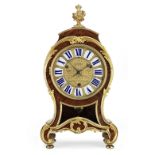 An gilt bronze mounted kingwood parquetry bracket clock with earlier quarter striking movement th...