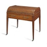 A late George III satinwood and tulipwood banded cylinder writing desk