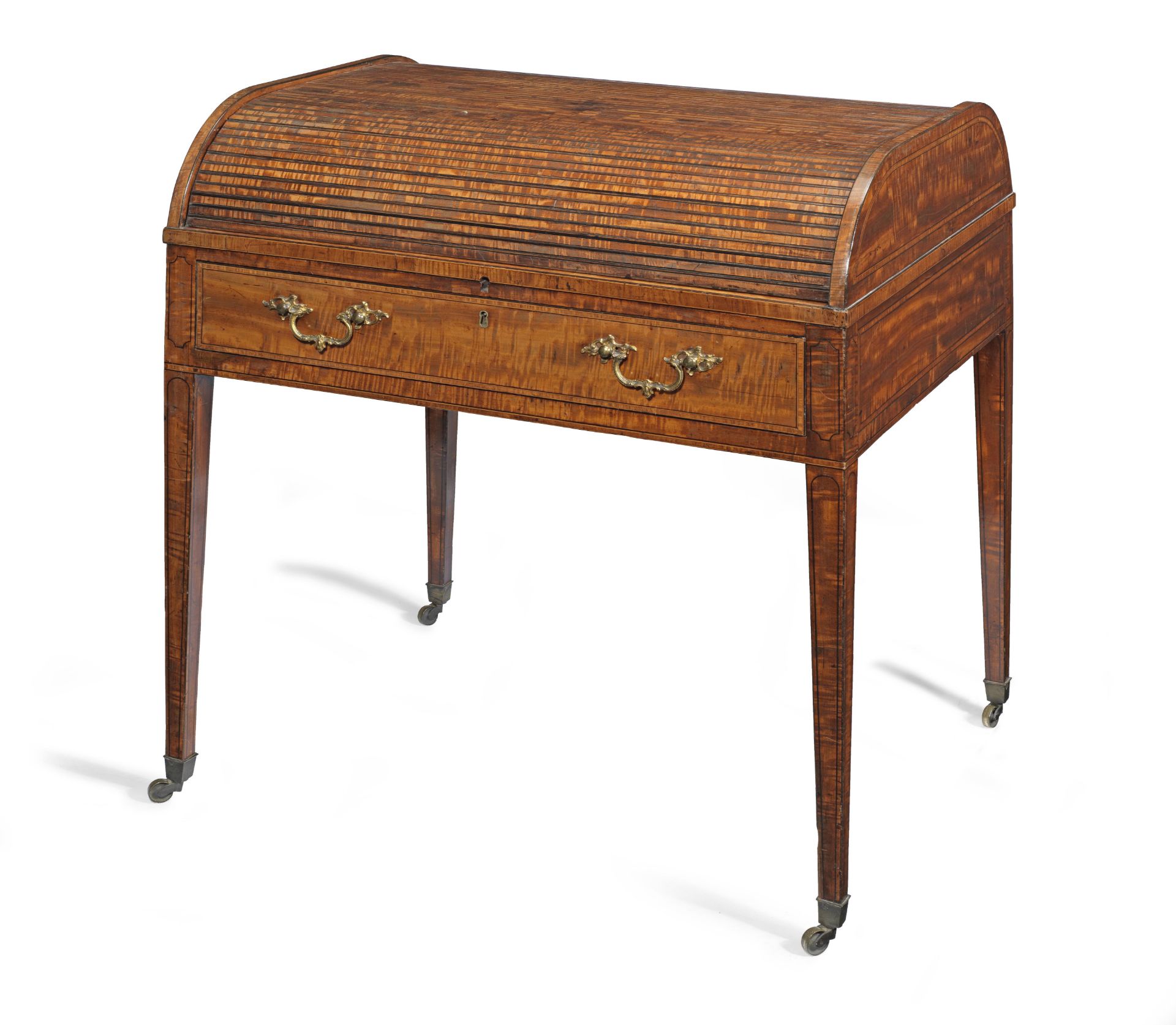 A late George III satinwood and tulipwood banded cylinder writing desk