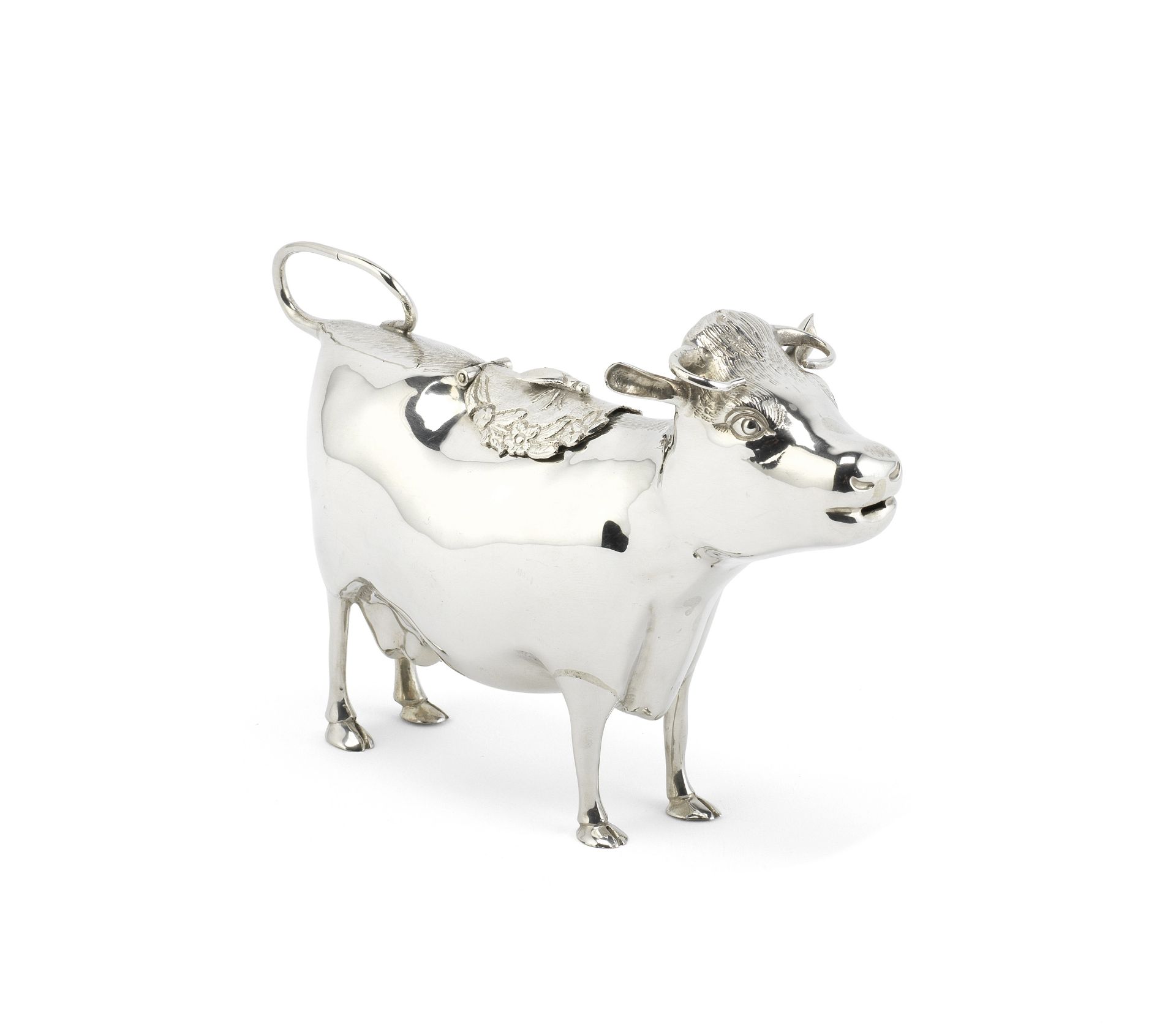 A silver cow creamer R Comyns, London 1962, also stamped Lowe & Sons Chester