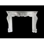 A late 19th century French carved white marble 'Pompadour' chimneypiece in the Louis XV style