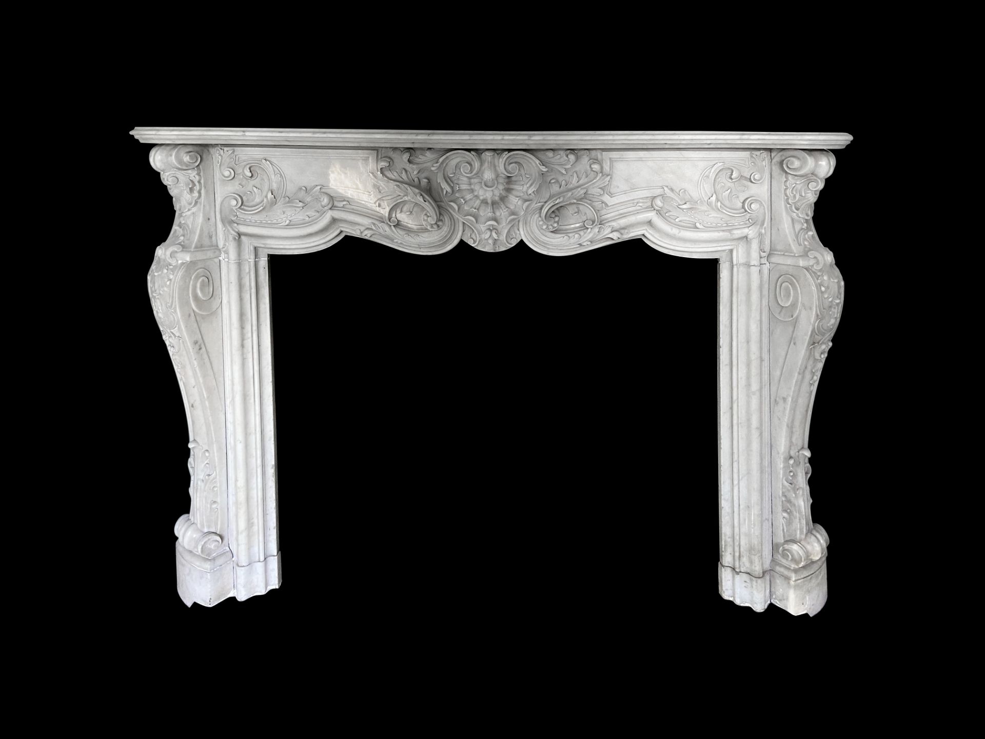 A late 19th century French carved white marble 'Pompadour' chimneypiece in the Louis XV style