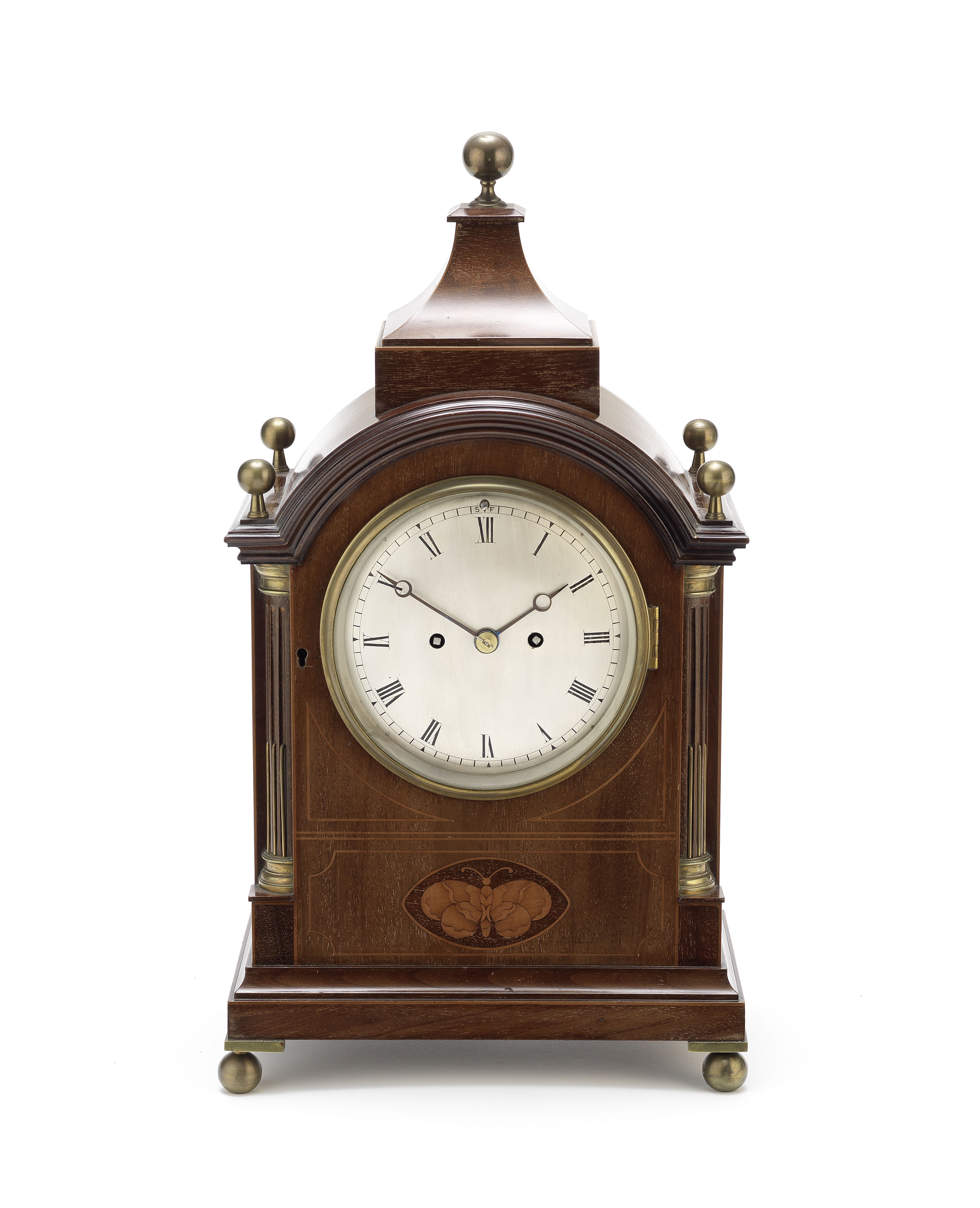 A late 19th century brass mounted mahogany and inlaid mantel timepiece