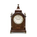 A late 19th century brass mounted mahogany and inlaid mantel timepiece