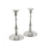 An unusual pair of George III silver candlesticks Samuel Roberts, George Cadman & Co, Sheffield 1...