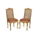 A pair of Louis Philippe giltwood salon chaises in the Regence style (2)