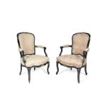 A pair of French 18th/19th century ebonised and parcel gilt fauteuils (2)
