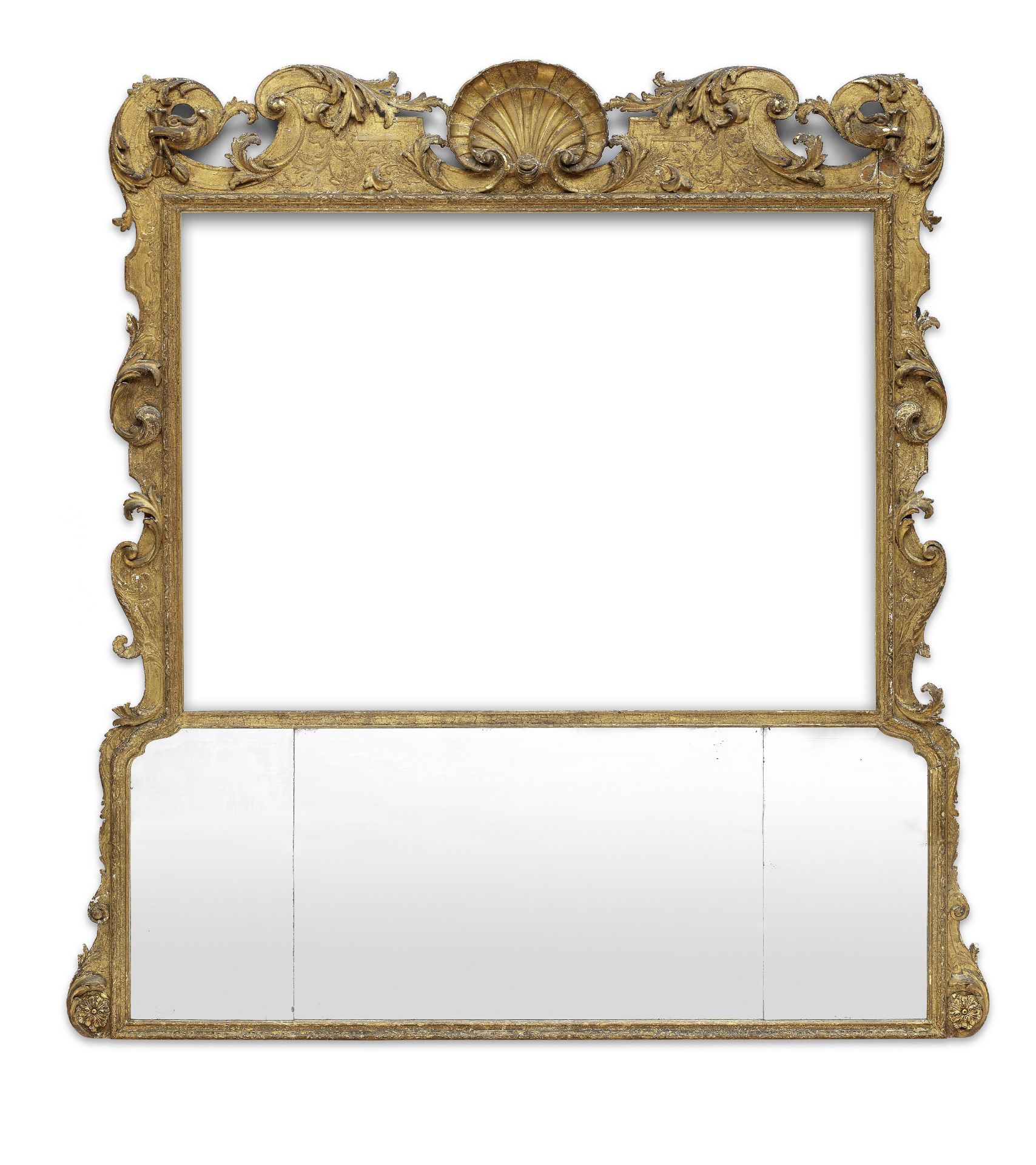 A George II giltwood and gilt gesso overmantel trumeau mirror lacking a picture within the upper ...