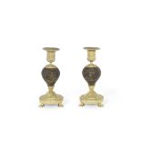 A pair of Louis XVI gilt bronze mounted Vernis Martin dwarf candlesticks (2)