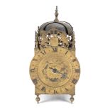 A late 19th century / early 20th century brass lantern clock in the 17th century style, the dial ...