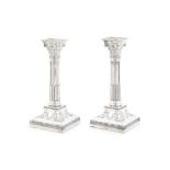 A pair of Edwardian silver dwarf candlesticks James Dixon & Sons, Sheffield 1908