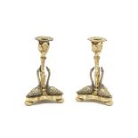 A pair of early Victorian silvered and parcel gilt swan candlesticks after a design by William Ba...