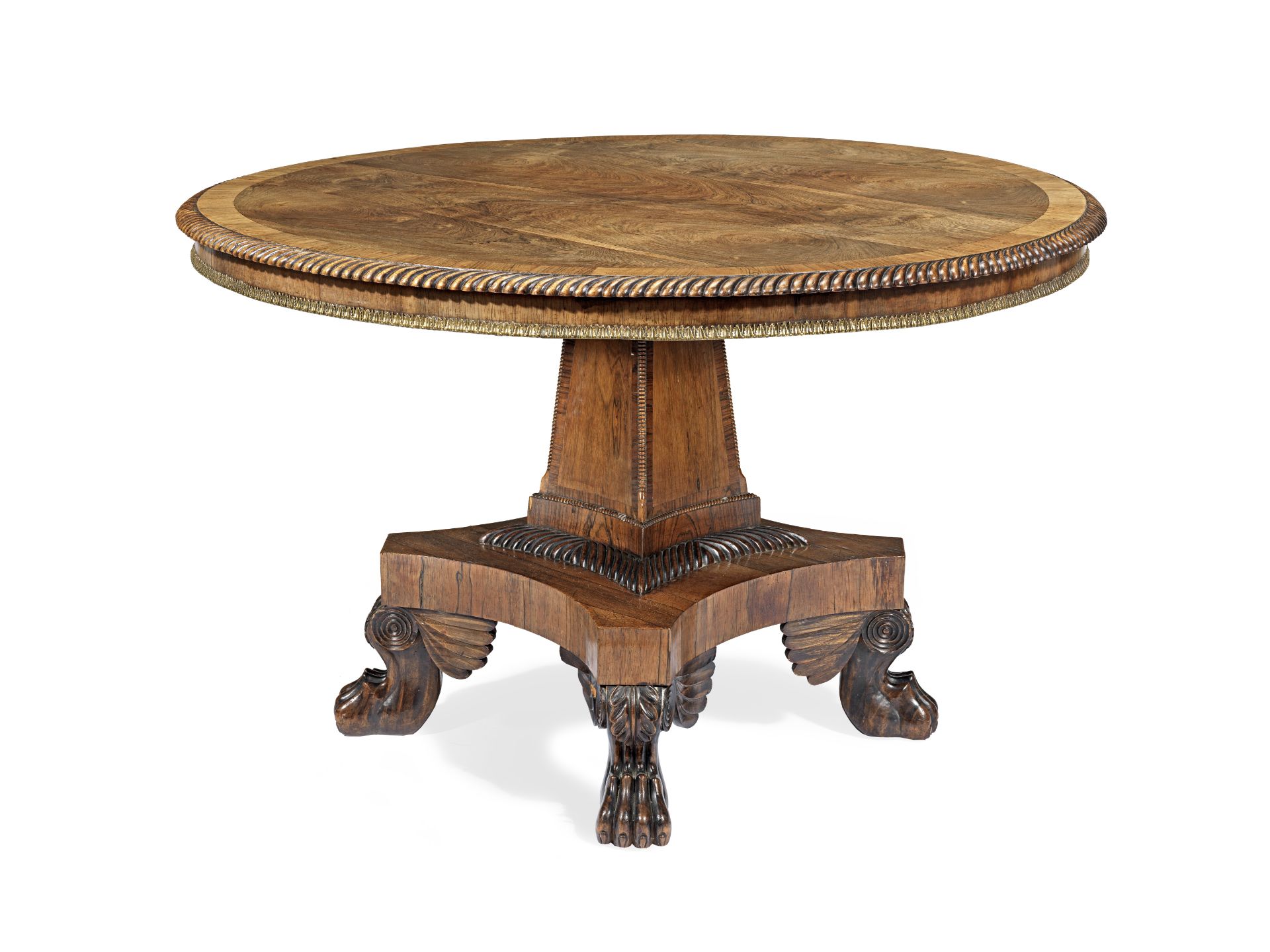 A George IV rosewood and crossbanded breakfast table in the manner of Joseph and Samuel Harper