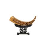 A large carved and reticulated buffalo horn 19th century (2)