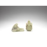 A pale green jade 'Buddhist lion and cub' box and cover and an archaistic pale green jade vase an...