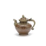 A copper alloy ewer and cover with silver-inlaid brass mounts 19th/20th century