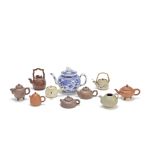 A small collection of teapots and covers China and Japan, 19th and 20th century (20)
