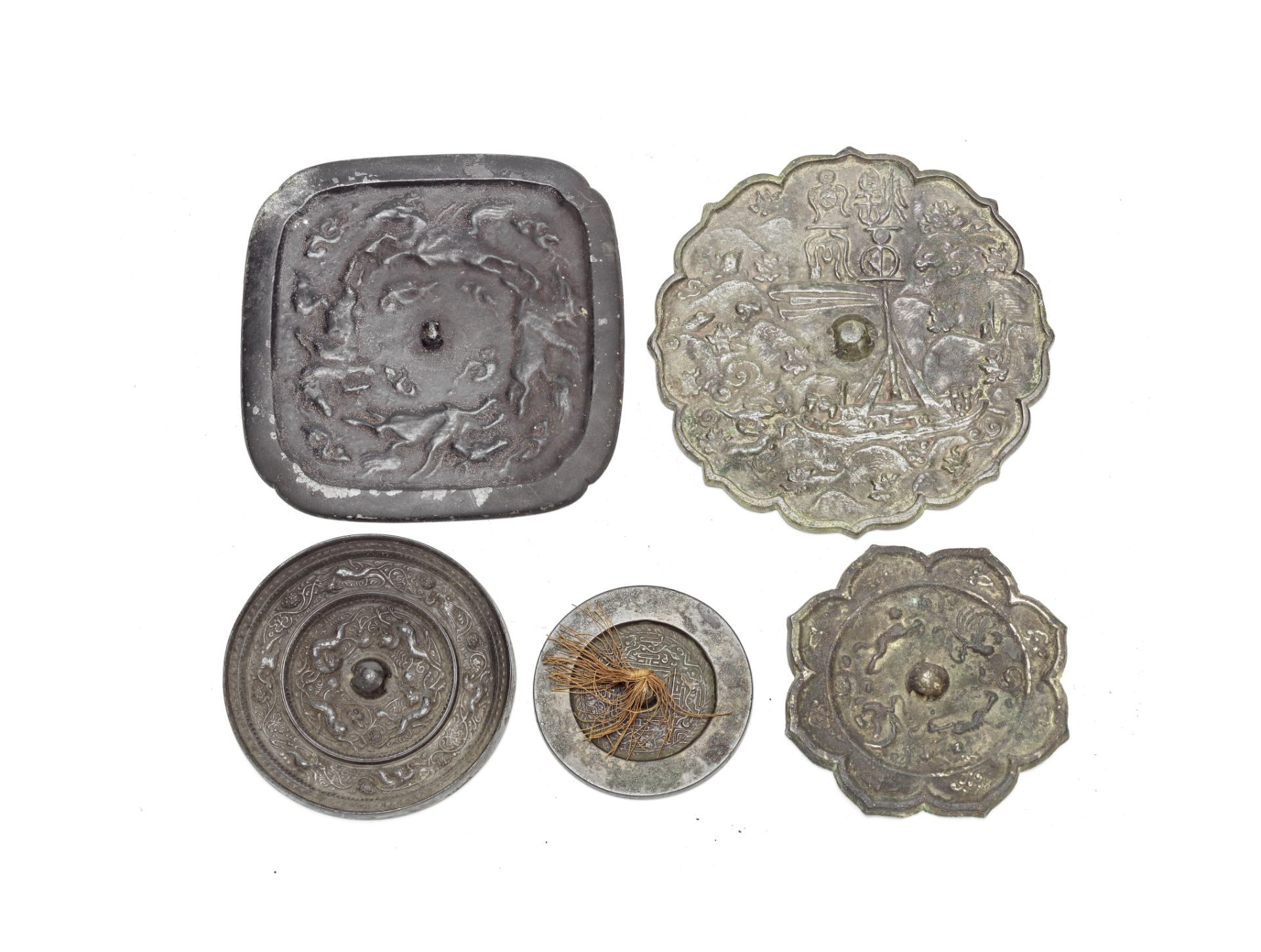 A group of five bronze mirrors Probably Han Dynasty and later (7)