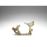 A green jade 'bird and dog' group Qing Dynasty