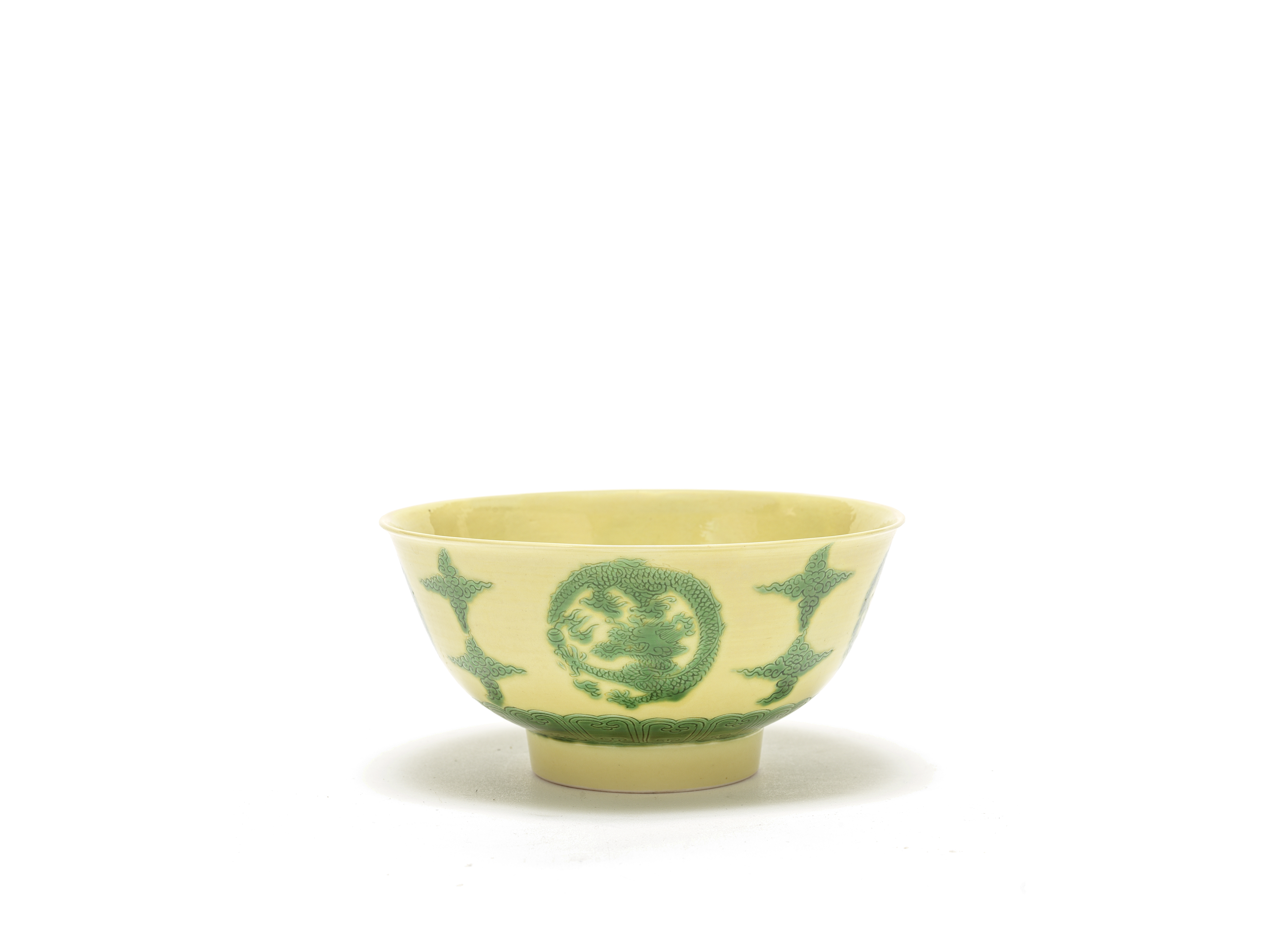 A yellow-ground green-enamelled 'dragon medallion' bowl Kangxi six-character mark and of the period