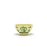 A yellow-ground green-enamelled 'dragon medallion' bowl Kangxi six-character mark and of the period