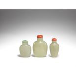 Two pale green jade snuff bottles and one glass snuff bottle 19th century and later (6)
