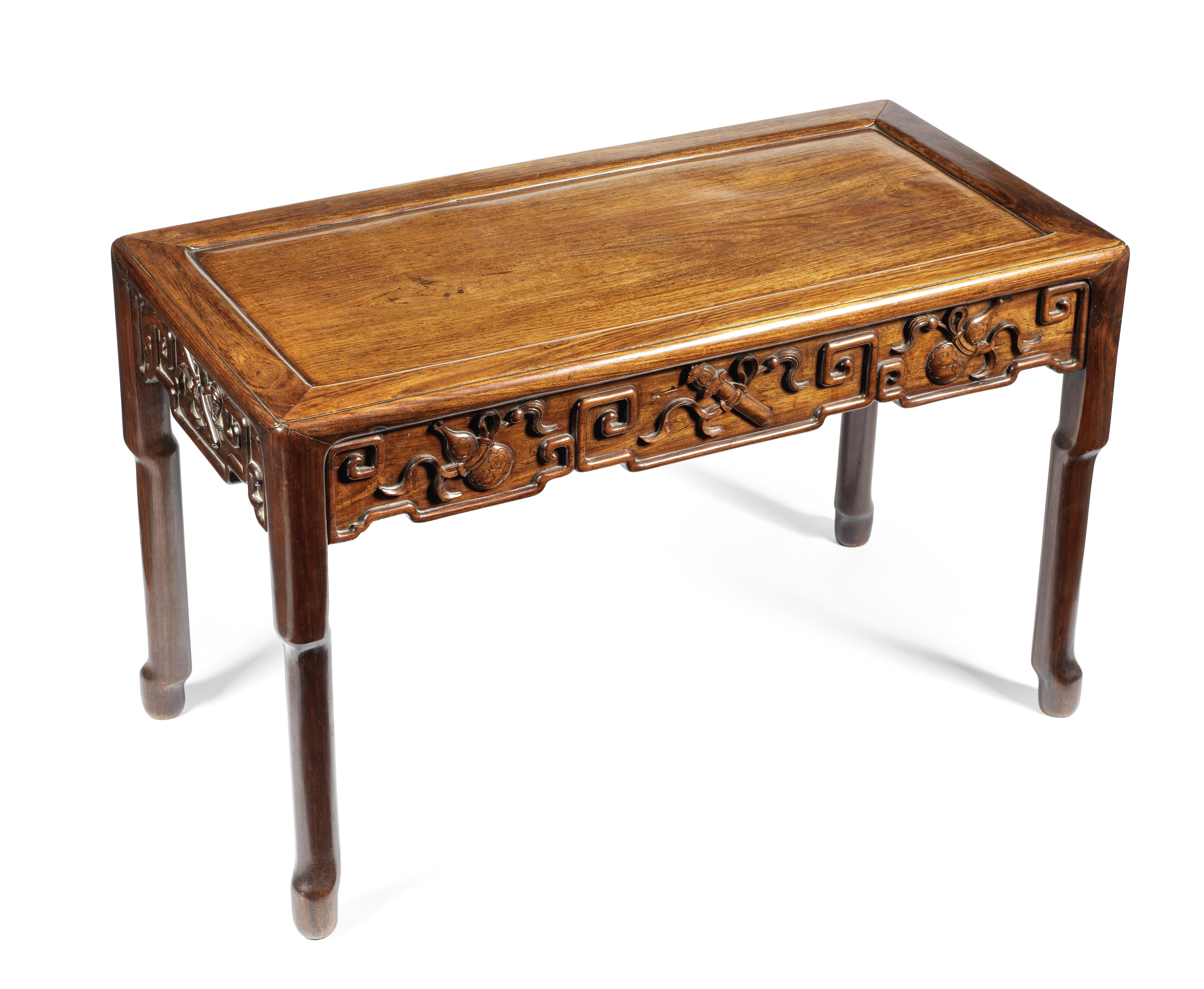 A huanghuali carved low table 19th century