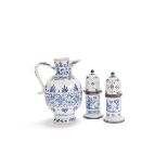 A blue and white 'floral' jug and a pair of white metal-mounted blue and white sugar casters The ...