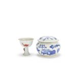 A blue and white box and cover and a copper-red decorated 'fish' stem cup Kangxi and later (3)