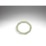 A green jade rope-twist bangle 19th century