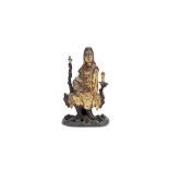 A gilt lacquered bronze model of Guanyin Ming Dynasty