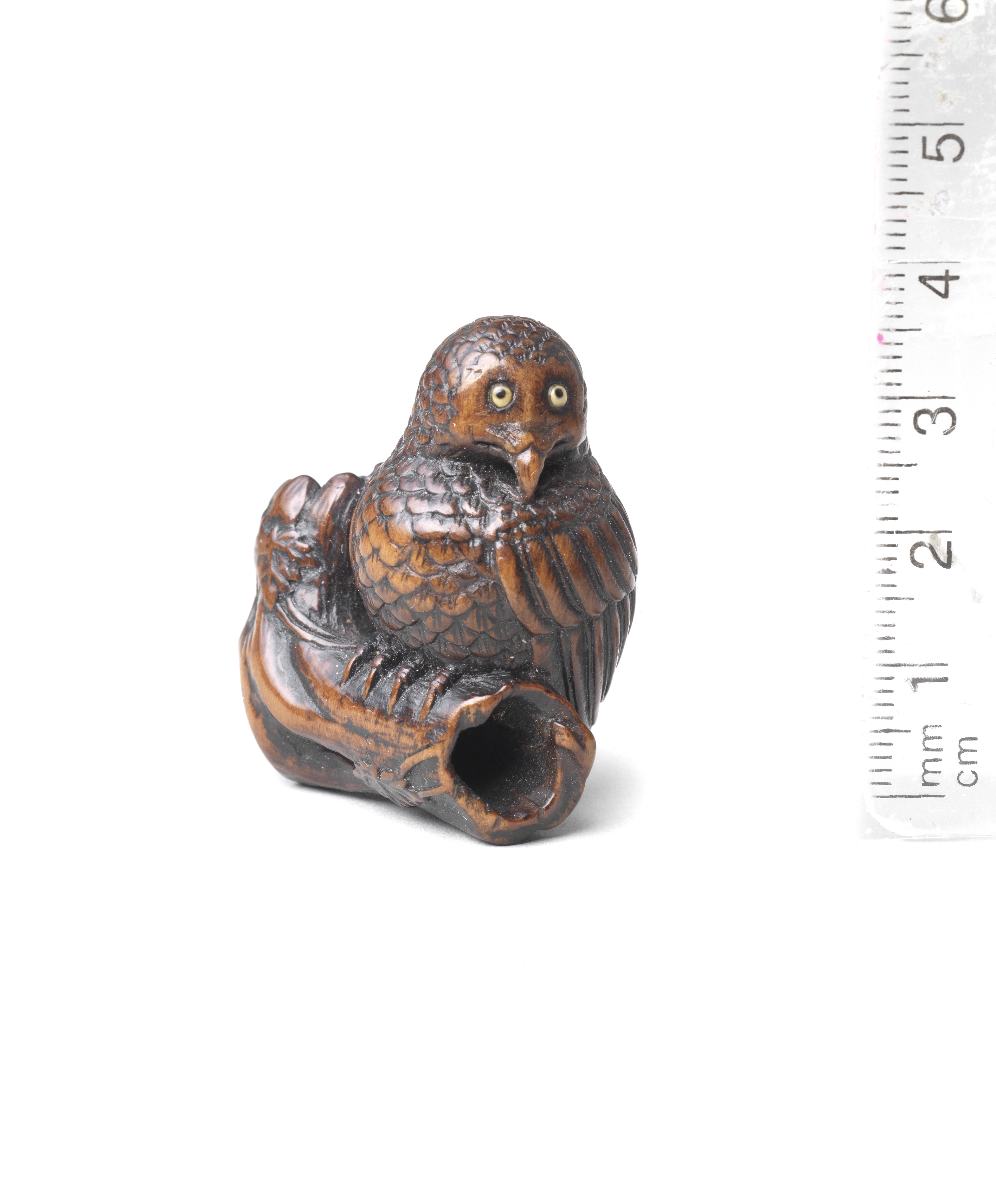 A wood netsuke of an owl 19th century