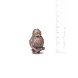 A wood netsuke of an owl Second half of the 19th century