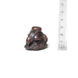 A wood netsuke of Raijin By Ittan, Nagoya, mid-19th century