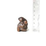 A wood netsuke of Kuzunoha By Masakazu, Nagoya, 19th century