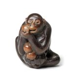 A wood netsuke of a monkey By Masakazu, Gifu, 19th century