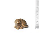 A wood netsuke of a tiger By Minsai, Tsu, Ise Province, early 19th century