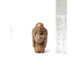 A wood netsuke of Hotei and a karako (Chinese boy) By Masatsugu, early 19th century