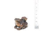 A wood netsuke of a toad and young By Miwa, Edo, early 19th century