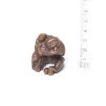 A dark wood netsuke of a monkey and young By Tomokazu II, Gifu, late 19th century